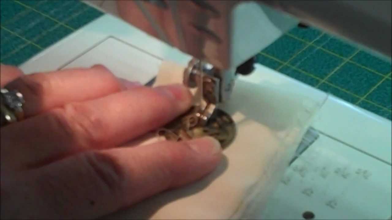 Quickly sew on a button with a sewing machine
